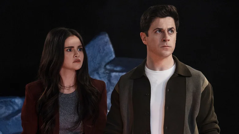 Selena Gomez as Alex Russo and David Henrie as Justin Russo looking alarmed and focused in Wizards Beyond Waverly Place.