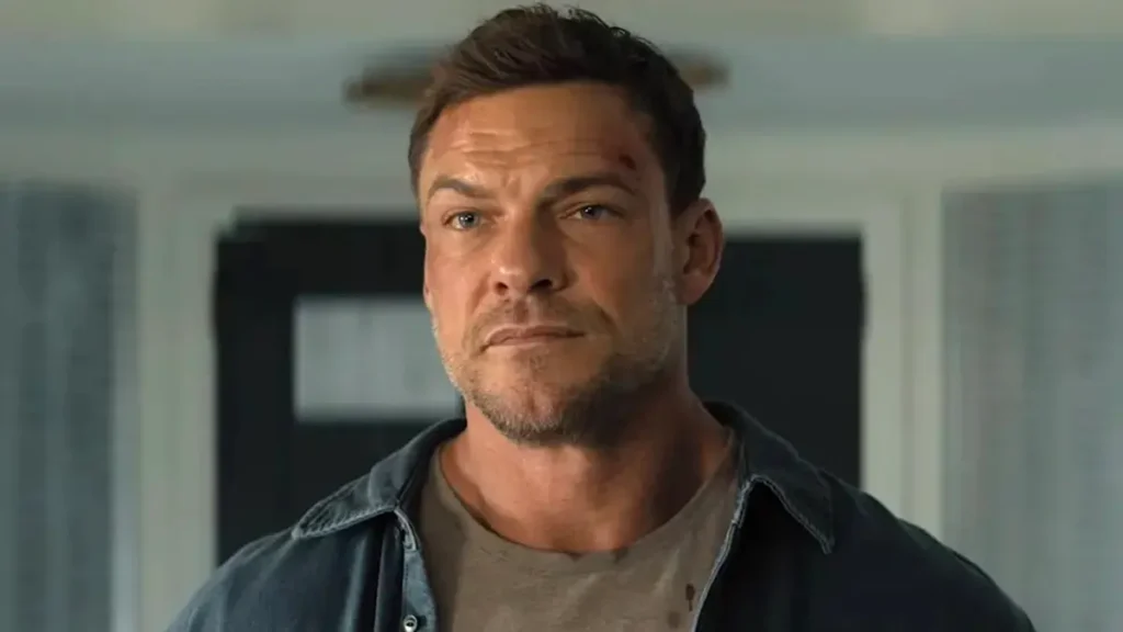 Reacher Season 4: Alan Ritchson Teases Massive Twist & Plot Spoilers Alan Ritchson with minor facial bruises looking intently at the camera in Reacher.