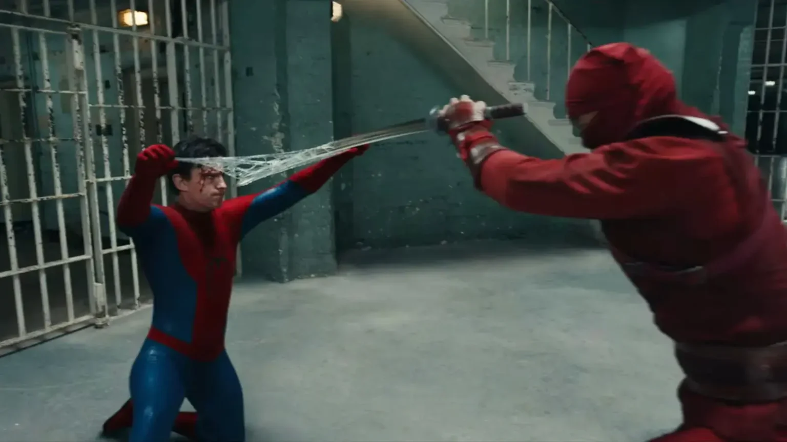 The Jean Grey Detail Hidden in ‘Spider-Man: Brand New Day’s’ Climactic Fight Spider-Man catching a red-clad ninja's sword strike with a web line inside a prison facility.